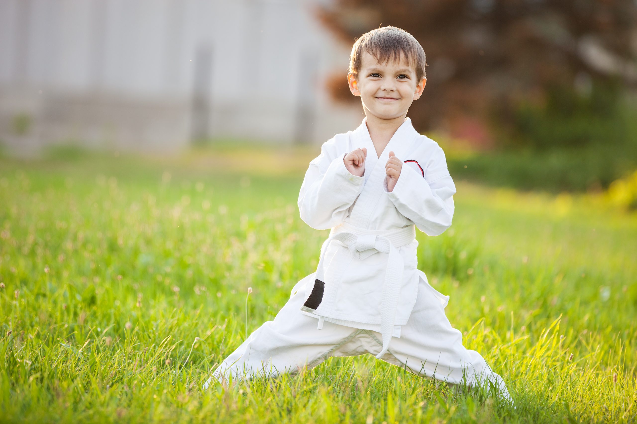 Preschool Boy Practicing Karate Outdoors Pbf5qdc